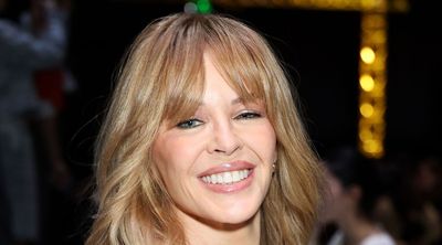 Kylie Minogue just delivered the most elegant guide to wearing white and tan this summer - her co-ord and mini bag are holiday-ready