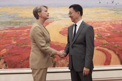 Rules-based order is ‘in our shared interest’, Cooper says during China visit