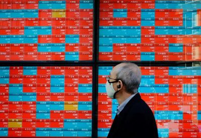 Japan's Nikkei retreats from record peak as market gauges fragile Mideast peace talks
