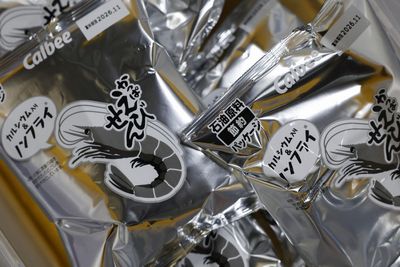 Calbee rolls out monochrome snack packaging amid ink supply worries