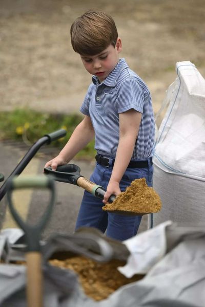 The sweet moment Prince Louis picked up a shovel for his first royal engagement