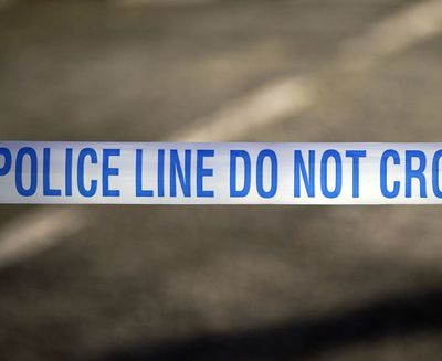 Woman charged with murder after body of man found in back of van in car park