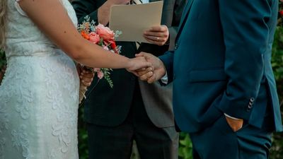 Groom finds his wife upset after a wonderful wedding weekend. Then he sees the wedding photos