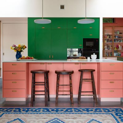 This vibrant kitchen pairs two trending colours in an unusual way to create a high contrast kitchen that is sure to raise a smile