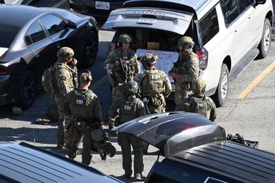 Second hostage walks free as Chase Bank crisis enters new phase
