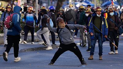 Bolivian ministers resign as weeks of protests against economic crisis rock government