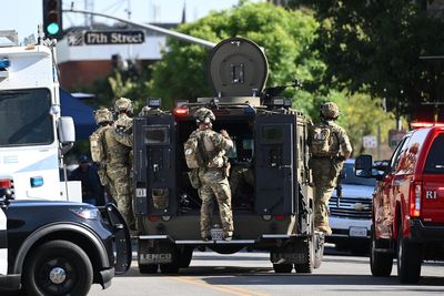 Suspect made eerie comment before taking hostages at Chase bank, witness says