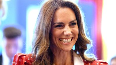 I've just noticed Kate Middleton's subtle nod to her family at the Cancer Research reception - it's not just her red dress which sent a message