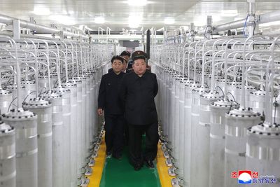 Kim Jong Un unveils new uranium-enrichment facility and vows to beef up nuclear forces