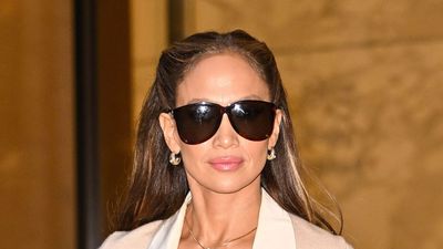Jennifer Lopez’s romantic blush pink outfit is a lesson in effortless satin skirt styling