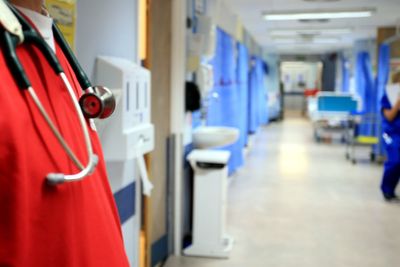 NHS staff should not wear political badges at work, says antisemitism review