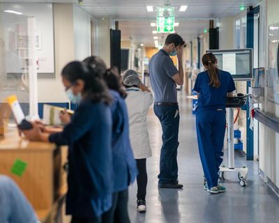 NHS to curb political symbols on uniforms after antisemitism report