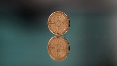 Bitcoin falls to $61,000, down more than 25% this month as long-term holders sell