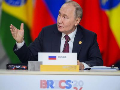 Putin faces rival visions of war and peace at Russia's 'Davos'