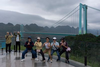 China’s highest bridge brings tourists and internet access to remote communities, in photos