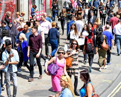 UK shoppers return to high street as warm weather brings respite from shadow of war
