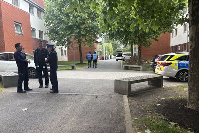 Man charged after staff member shot with crossbow at student village