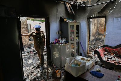 Unregistered Sri Lankan nursing home lies in ruins as toll from deadly fire rises to 13