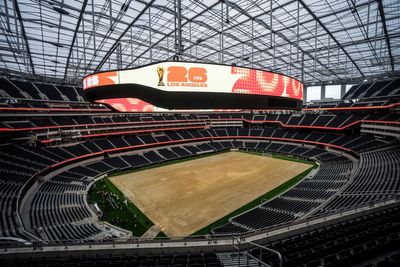 Stadium workers near Los Angeles vote to authorize a strike days before the World Cup begins