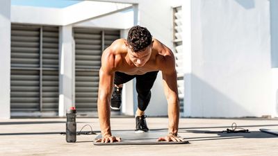 Forget sit-ups and crunches — I added this three-legged plank and tiger curl combination to my ab workouts and it's a game changer