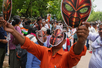 Hundreds don masks as supporters of India’s viral ‘Cockroach People’s Party’ stage first protest