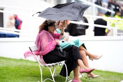 Sunday to be drier as downpours and strong winds batter the UK