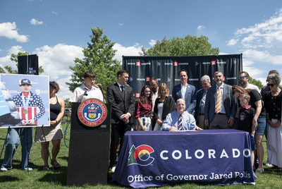 Colorado Governor signs bill to honour legacy of Magnus White and 'turns tragedy to action'
