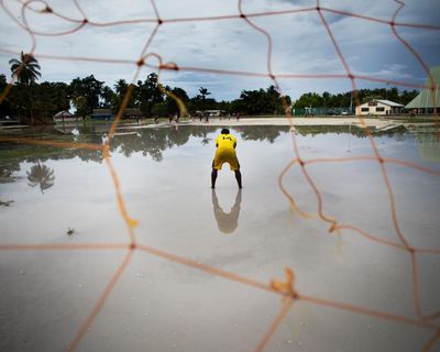 ‘This may be our last chance’: rising sea levels threaten Kiribati’s World Cup dream