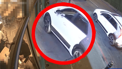 Terrifying moment hitman shoots victim outside busy restaurant in London gang war