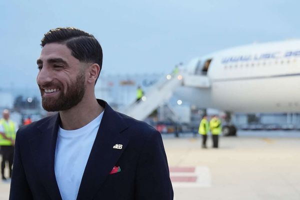 Iran's World Cup players wear pins for victims of deadly strike on school as they arrive in Mexico