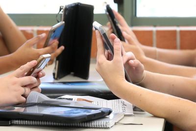 Another country to ban mobile phones in schools as reading levels fall