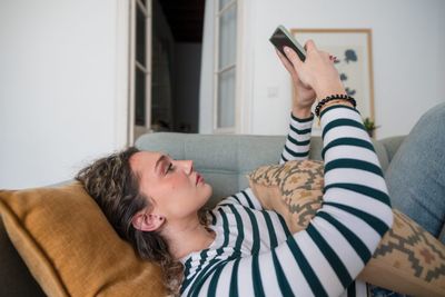 Gen Z hiring manager says CEOs are right about her generation’s 'attitude' problem after a candidate took the interview from her phone