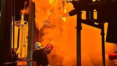 Ukrainian strikes start fires at oil facilities in Russia and Crimea, officials say