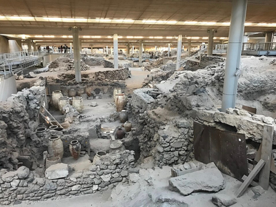 In 1967, an archaeologist’s spade bit into volcanic ash on Santorini, and Akrotiri emerged like a Bronze Age time capsule