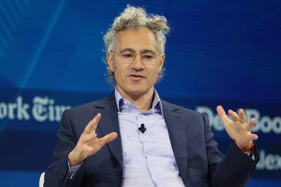 Palantir CEO Alex Karp says executives who brag about their AI cuts might as well 'sign up for the Bernie Sanders manifesto'