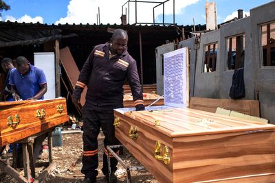 Some burial societies in Africa now focus on helping the living, too