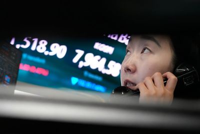 Asian shares fall after a tech sell-off on Wall Street, while oil prices gain