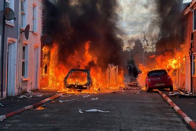 Belfast in flames: 'Thuggery' condemned as homes and cars set on fire amid uproar after knife attack