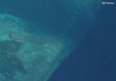 Philippines urges China to remove shoal structure, warns against island-building