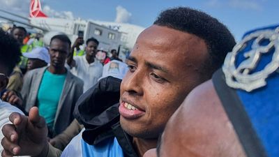 Somali World Cup referee Omar Artan receives warm welcome home after being denied entry to US