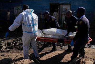 Multiple attackers kill 12 people and wound 9 in a late-night shooting in South Africa