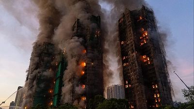 Hong Kong charges seven people and two firms over massive fire that killed 168