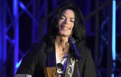 Why A Controversial Neverland Painting Of Michael Jackson As Jesus Is Sparking Fury