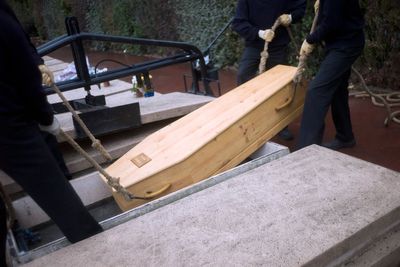 Grieving widow sues after late husband’s body falls from casket during burial