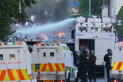 Police deploy water cannons as riots continue in Northern Ireland following Belfast knife attack