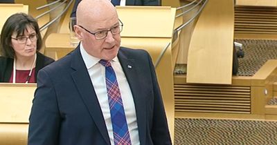 John Swinney tells Reform UK they are 'inciting racial hatred' in heated FMQs