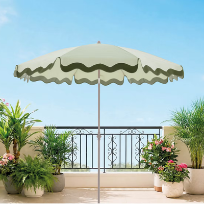 Aldi’s £13 scalloped parasol looks like it came straight from a Mediterranean resort – it’s perfect for giving your garden a chic, hotel look