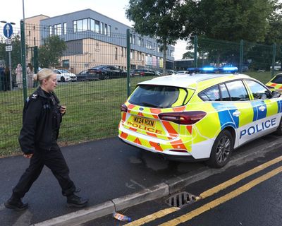 Girl, 14, charged in connection with triple stabbing at school in Manchester