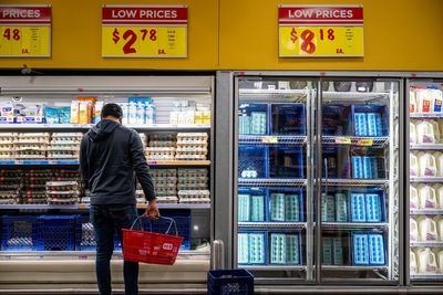 Major grocery chains like Walmart and Kroger are lowering prices on thousands of items as they try to compete with warehouse brands