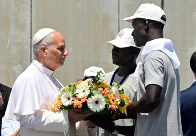 ‘All of us are migrants,’ pope says on last day in Spain